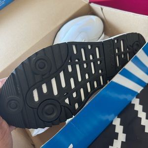 Brand new adidas shoes. Never worn. Womens 9.5.